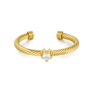 Aprilery Golden Cable Bracelet – Wing & Zircon Design Symbolizing Freedom and Strength