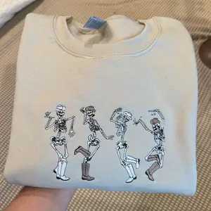 Dancing skeletons in boots embroidered sweatshirt