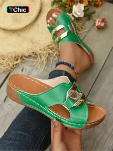 A pair of new large-size women's open-toe hollow-out sandals with metal buckle decoration, slip-on, fashionable, simple, comfortable, lightweight, casual, versatile, with a wedge heel and thick sole