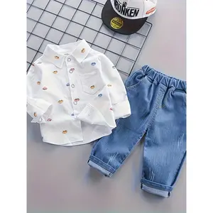 New spring and autumn boys' suit, Western style, casual and fashionable, featuring a car-patterned shirt and jeans, two-piece set, perfect outdoor activities