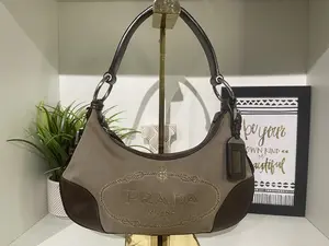 Pre-owned PRADA Leather/Canvas Shoulder Bag Signature Logo Jacquard Handbag Classic Design, Elegant Style, Versatile Use, Ideal for Everyday Wear