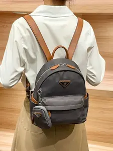 Large-capacity lightweight women's backpack, new versatile and fashionable ladies' backpack made of nylon and genuine leather for commuting