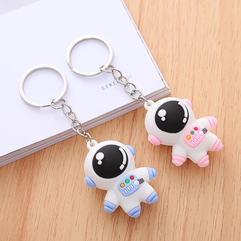Cute Astronaut Keychain Pink and Blue Dual Color Adorable Spaceman Pendant Charm for Bags Keys Phones Perfect Small Gift for Birthday Holiday Party Favors Daily Decoration Accessory for Kids Adults Space Lovers Premium PVC 3.74 inches