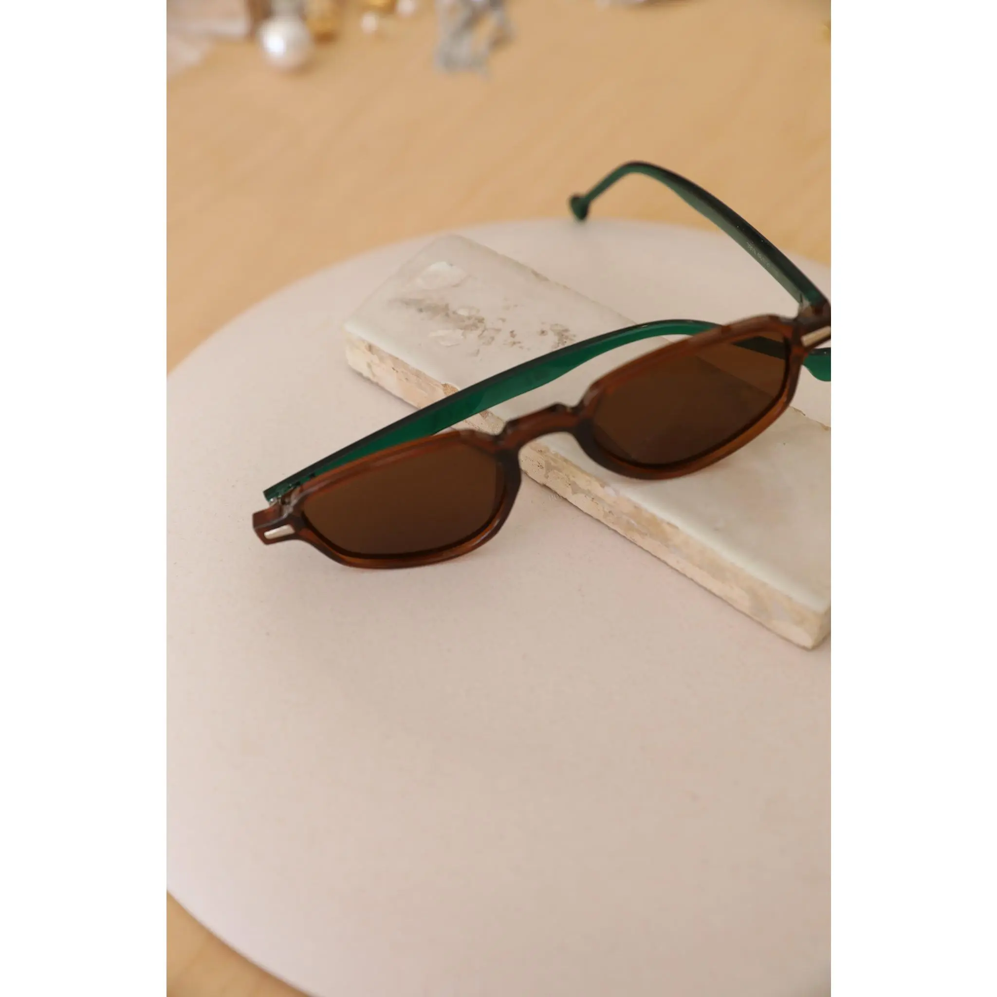 Rae: Rivet Oval Sunglasses with Green Lining