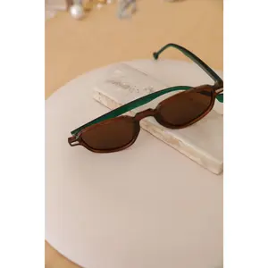 Rae: Rivet Oval Sunglasses with Green Lining Rae: Rivet Oval Sunglasses with Green Lining