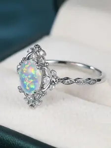 A new design egg-shaped white synthetic Opal ladies' ring , featuring a stylish, minimalist, and versatile everyday style, Elegant Casual Ring