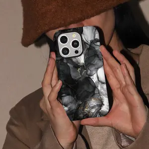 This durable, shock-absorbing, glossy black and white marble-patterned phone case is compatible with iPhone 17, 16, 15, 14, 13, 12, 11, X, and Samsung models. It makes a great holiday gift for friends or family.