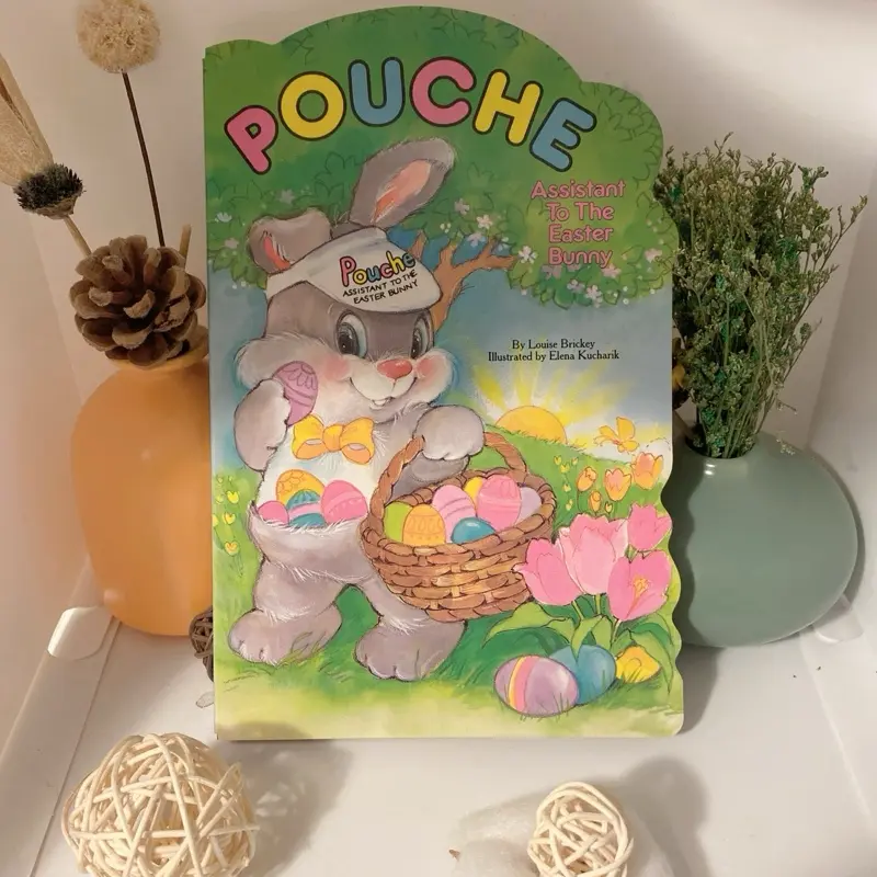 Pouche Books - "Pouche: Adventures with the Easter Bunny" by L. M. Montgomery - Featuring Rabbit in Basket with Eggs