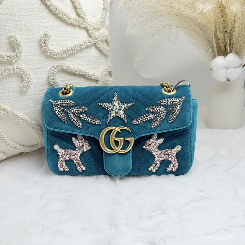 Pre-owned GUCCI GG Marmont Matelassé embellished velvet crossbody bag in turquoise with crystal deer and leaf appliques WWL