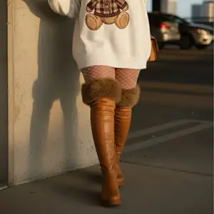 MEGHANI Tan Knee-High Boots with Plush Fur Trim & Rubber Outsole for Winter Glam Comfort and Style