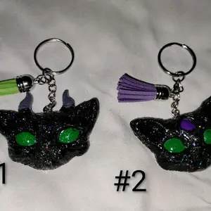 Evil Cat Keychain with Glittery Black Finish Green Eyes & Purple Tassel Accessory for Bags and Keys