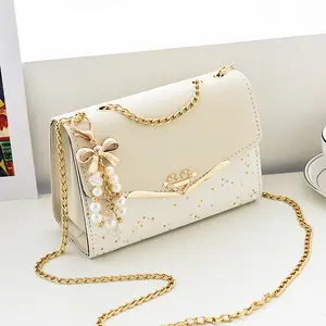 This princess-style small crossbody bag with a delicate heart lock and pearl bow tassel instantly elevates any outfit, making you feel luxurious and elegant from morning to night✨