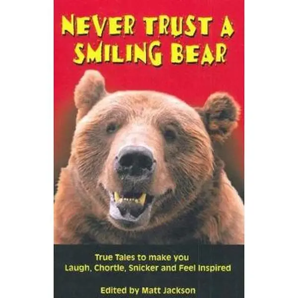 USED Book - Never Trust a Smiling Bear: True Tales to Make you Laugh, Chortle, Snicker and Feel Inspired (Outdoor Humor) by Matthew Jackson (Paperback) - english
