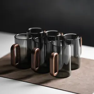 2/4/6 PCS Glass Tea Cups made from high borosilicate glass, Drinkware, Glass drinking cup, heat resistant drinkware for kitchen essentials, designed for tea time rituals, living room serving, and home decor setups with transparent smoky green cups