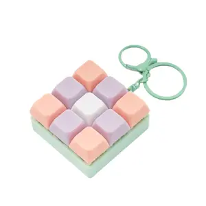 Fidget Keychain with Color-Changing Squishy Buttons - Multi-Color OptionsFidget for Adults & Teens,, Focus Aid, Portable Device, Ergonomic Fingertip Button Press Keychain with Smooth Squishy Texture & Clear Cap for Button Mechanism, Compact & Portable