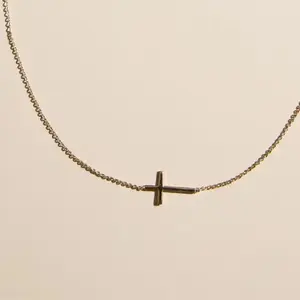 Gold Sideways Cross Necklace