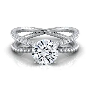 The Nona Twisted Solitaire Engagement Ring Setting for Round Diamonds in Platinum