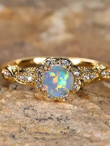 A geometric design ring for women, Artificial Gemstone Ring, featuring synthetic colored zirconium, high-end vintage gold, perfect for weddings and special occasions.