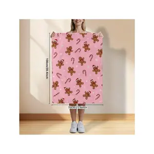 Cozy Pink Christmas Blanket with Gingerbread Men, Candy Canes & Snowflakes