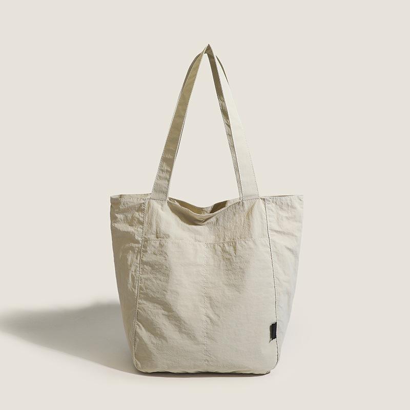 Minimalist Large-Capacity Canvas Tote Bag Versatile Shoulder Handbag for Commuting and Students Waterproof Nylon Casual Women's Bag