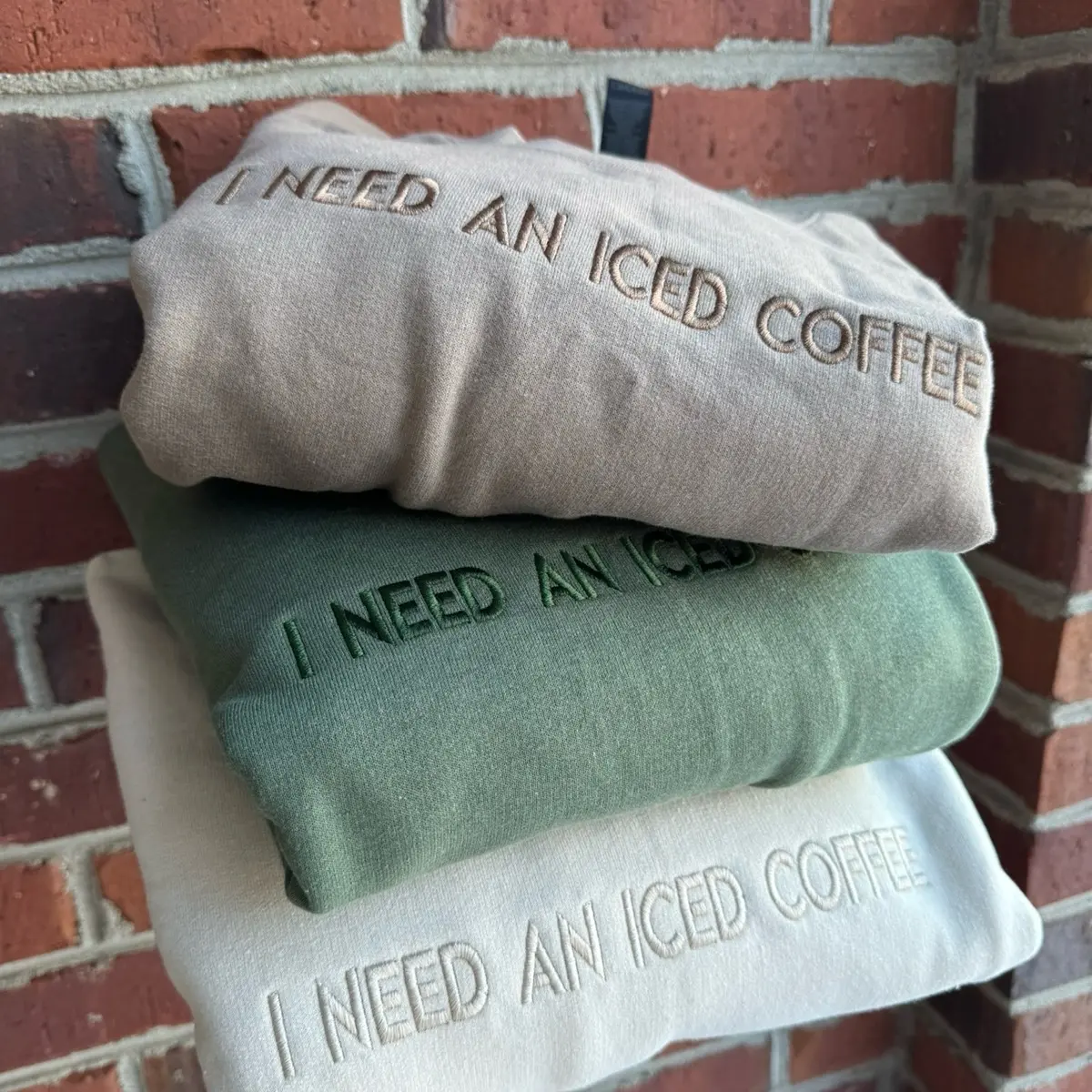Embroidered “I NEED AN ICED COFFEE” trendy and minimalist monochromatic crewneck neutral