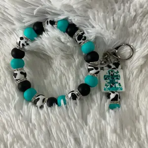 Every rejection is gods protection wristlet + keychain