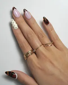 Tortoise & Cream Polished Statement Nails with Tortoise Shell Accents Creamy Ivory Blush Pink Subtle Dotted Details Comfortable Lightweight Salon Level Style