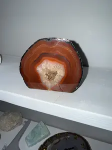 Banded agate geode with druze