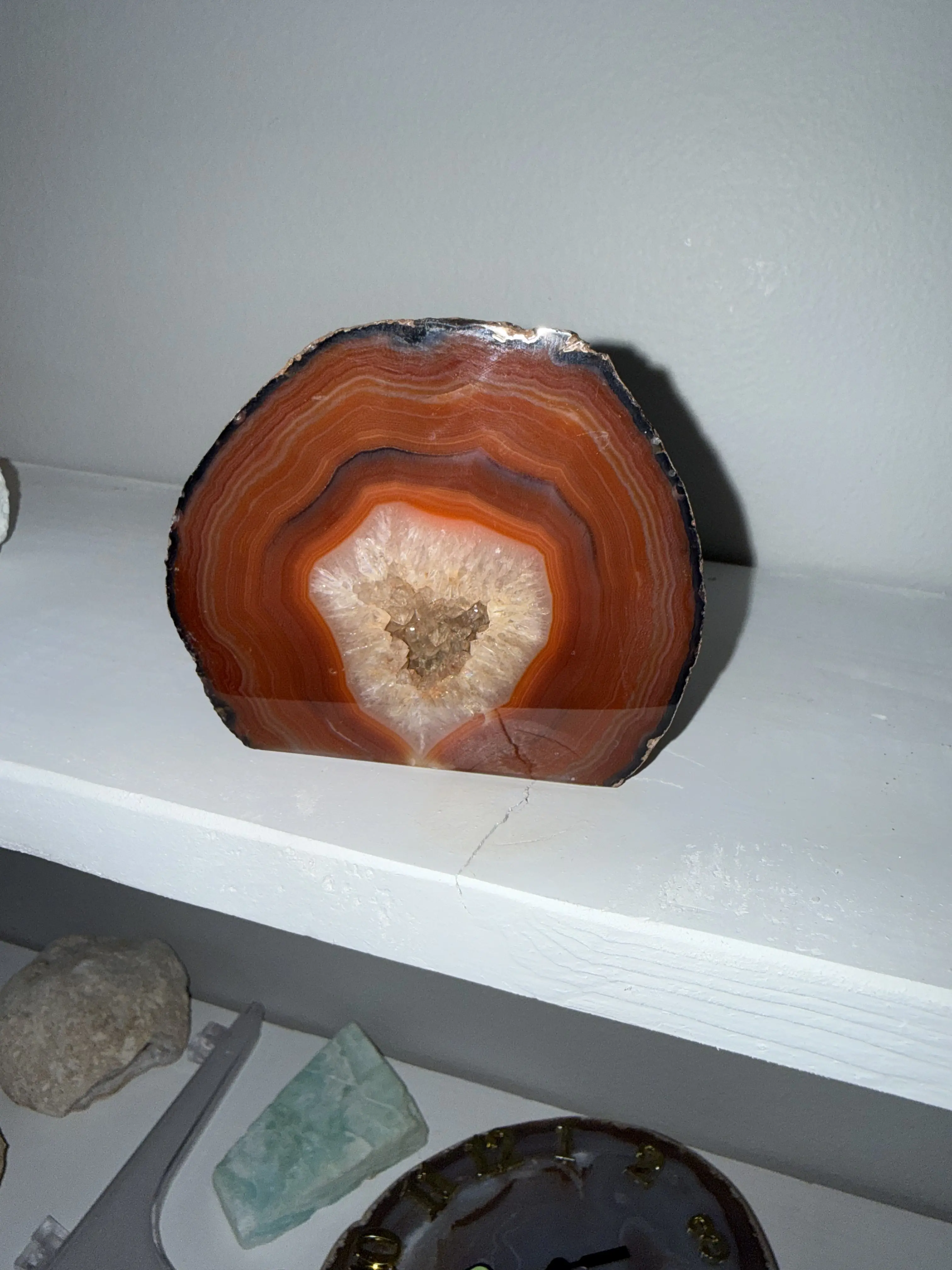 Banded agate geode with druze