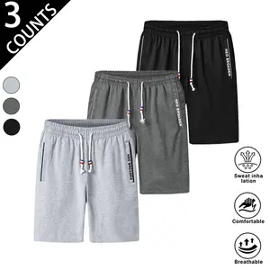 3-pack men’s casual athletic shorts featuring a drawstring elastic waistband and side zip pockets; breathable, comfortable fabric with a loose fit—ideal for everyday wear, sports, and fitness; versatile, practical, and cool.