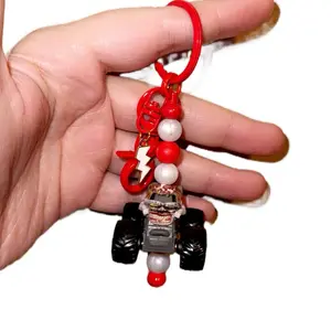 Monster Jam Keychain - Customizable Design with Red and White Elements, Includes Keyring Attachment