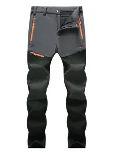 Men's Regular Fit Warm Softshell Pants with Fleece Lining, Windproof and Water-resistant Pants for Winter Outdoor Activities, Multiple Zipper Pockets Pants