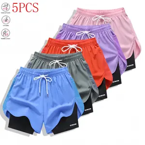 One pack contains 5 women’s casual athletic shorts in a single color, featuring a faux two-piece design, built-in lining, and an elastic waistband with stretch for a secure fit. Suitable for outdoor fitness, running, sports, and casual wear; women’s short