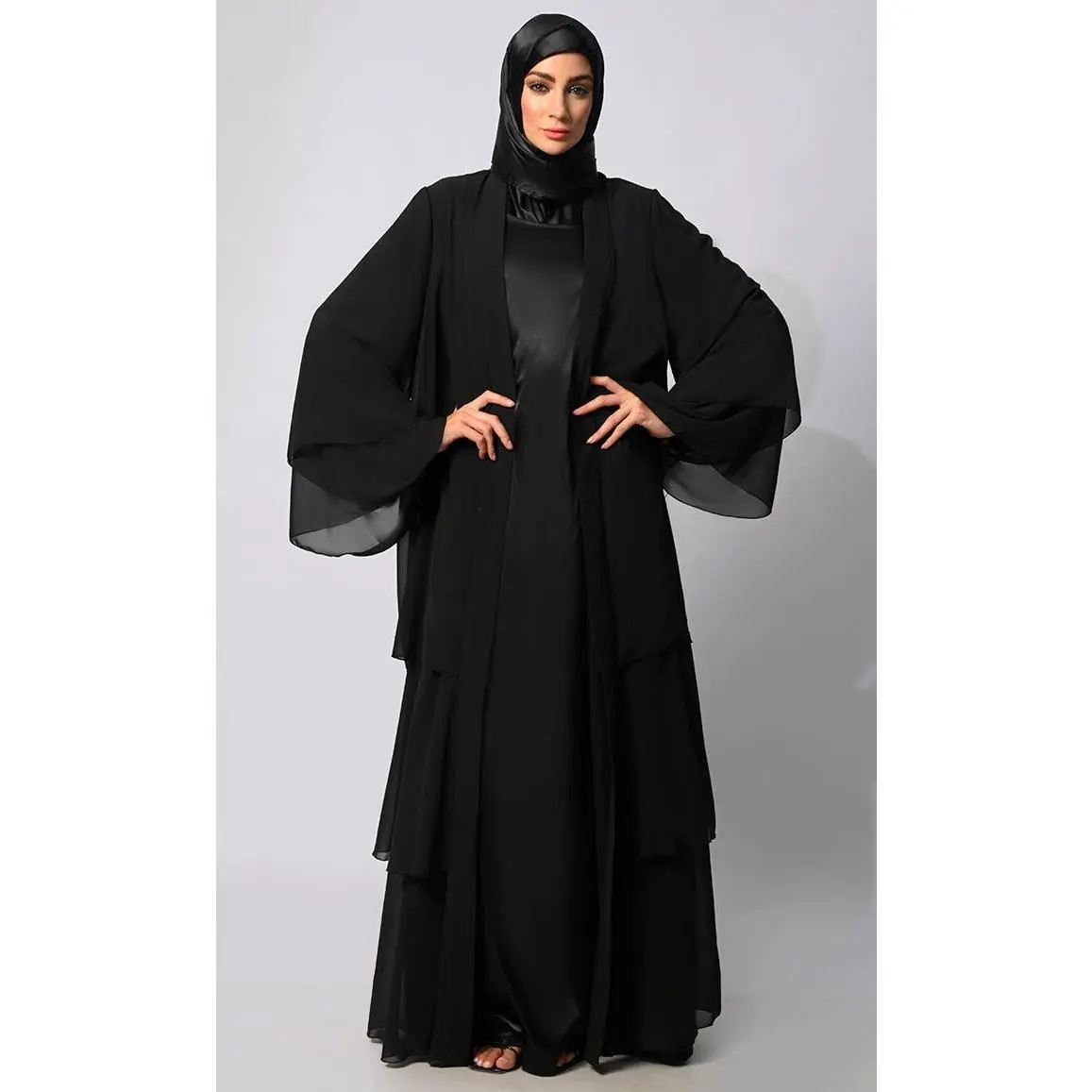 Elegance in Layers: Black Tiered Shrug with Satin Lining