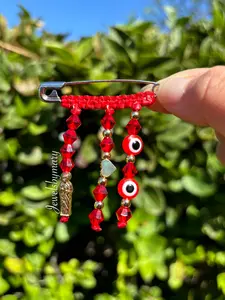 Red San Judas pregnancy brooch