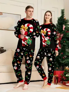 A man/woman couple Christmas long-sleeved and long pants set with Christmas tree and sock light star prints. The round-neck design is a unisex single set