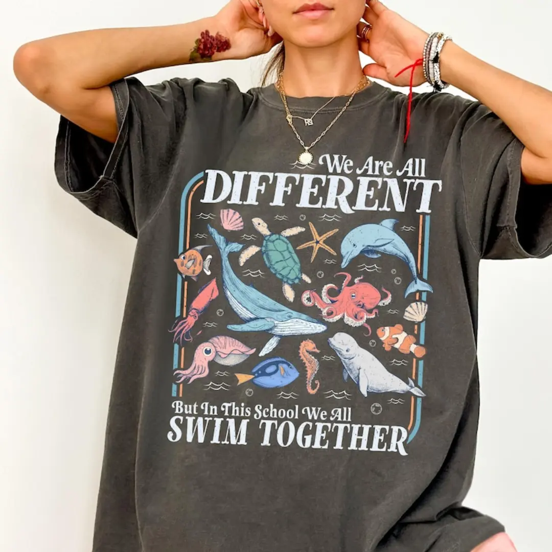 HappyShift - Comfort Colors We All Swim Together Shirt, Teacher School Shirt, Ocean Animal Classroom Tshirt, Kindness Graphic Tee, We Are all Different