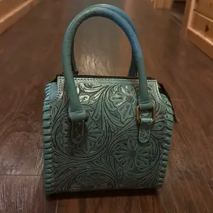 Mini Turquoise Tooled Speedy Handbag with Floral Embroidery and Blue Handles