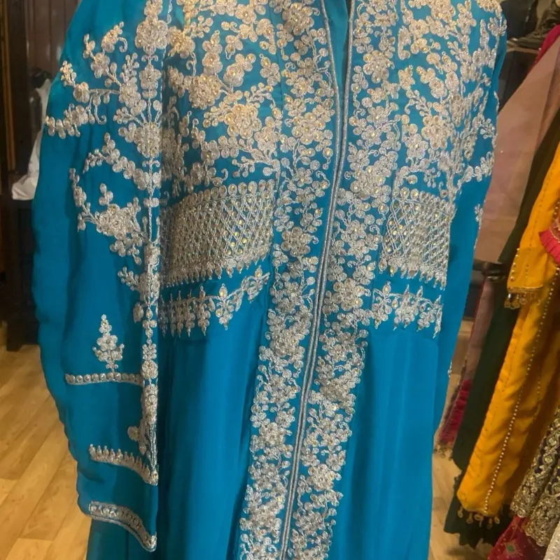 Pakistani Dresses - Blue Color with Intricate Design as Showcased in the Image party wear
