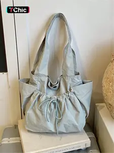 Lazy style drawstring drawstring tote bag with soft silhouette, drawstring details, and side pockets, can be carried on one shoulder or under the armpit, suitable for daily commuting, school, and shopping, with a gentle and relaxed atmosphere. Whoever car