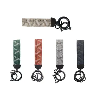 Level Up Your Daily Carry. This Universal Keychain is a Durable Metal Horseshoe for Your Car Keys & a Printed Leather Lanyard for Your Phone. The Perfect Gadget Gift.