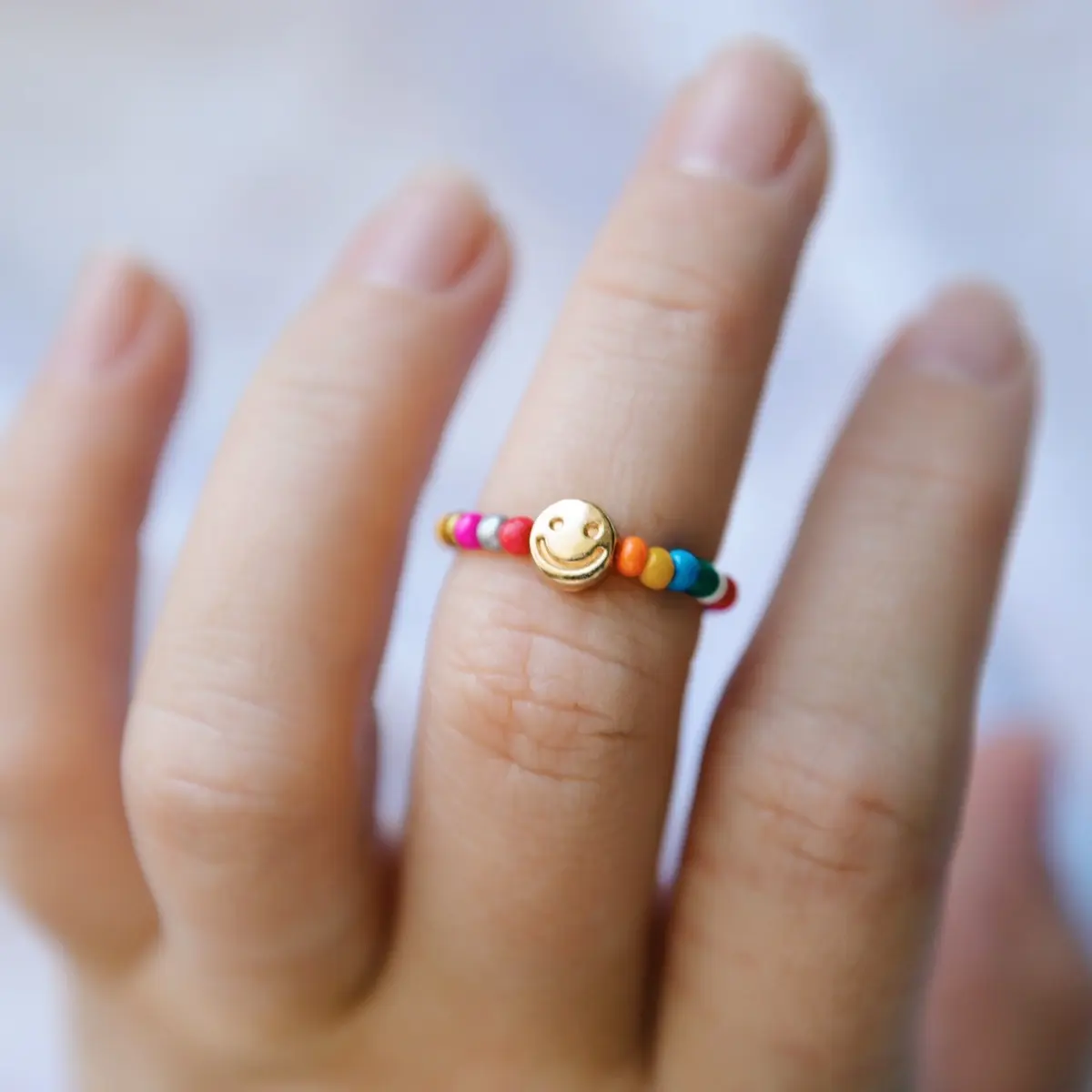 Rainbow & gold smiley face beaded ring Rainbow & gold smiley face beaded ring