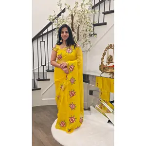 Reyavogue Women's Yellow Saree With Floral Work Border paired with patterend blouse