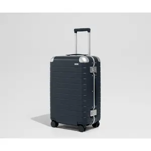 The Aluminum Edge Bigger Carry-On in Navy Blue