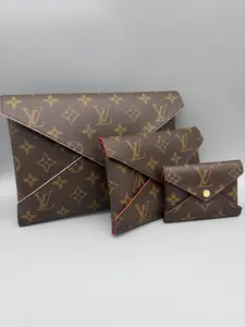 Pre-owned Louis Vuitton Coated Canvas Clutches & Wristlets Kiragami Monogram Canvas Three Piece Set with Classic LV Pattern for Versatile Use