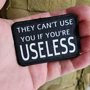 the can't use you if you're useless meme 2"x3" removable morale patch with hook and loop backing