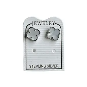 Bello y sutil diseño de aretes de flor con perla de mar. Plata Italiana 925