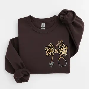[Custom Name] Leopard Stethoscope Bow Sweatshirt or T-Shirt, Coquette Nurse Hoodie, Nurse Appreciation Gift, Nursing Student Sweatshirt, Healthcare Sweater.