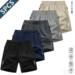 Men’s quick-dry athletic shorts featuring five reflective stripes, zipper closure, and drawstring waist; side zip pockets paired with orange interior details enhance practicality and visual contrast. Side reflective stripes improve nighttime visibility an