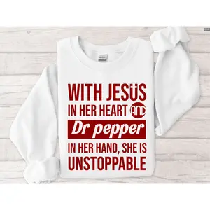 With Jesus In Her Heart And Dr Pepper In Her Hand She Is Unstoppable Sweatshirt - Hoodie - Tshirt, Retro Crewneck, Gift For Lovers, Cotton, Trendy Womenswear Top
